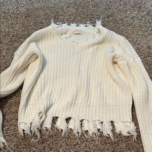 Frayed Cream Sweater Poof size small
